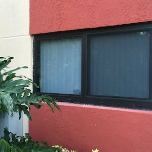 Hurricane impact resistant window